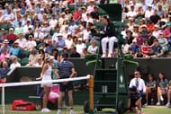 Mirra Andreeva argues with the umpire at Wimbledon 2023